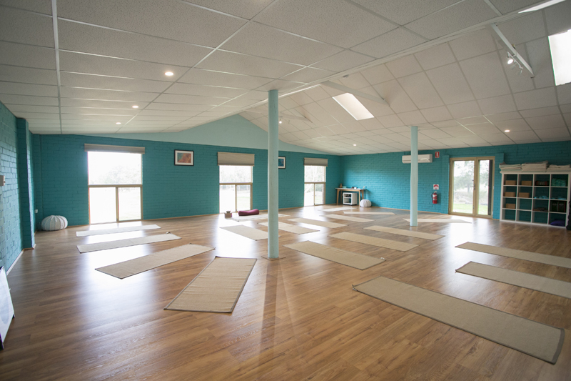 yoga on the farm studio om, yoga mats on the floor